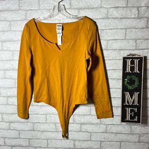 Pink Victoria’s Secret bodysuit size L